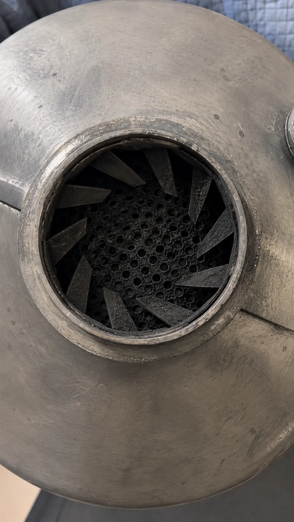 Heavily contaminated diesel aftertreatment component before professional cleaning